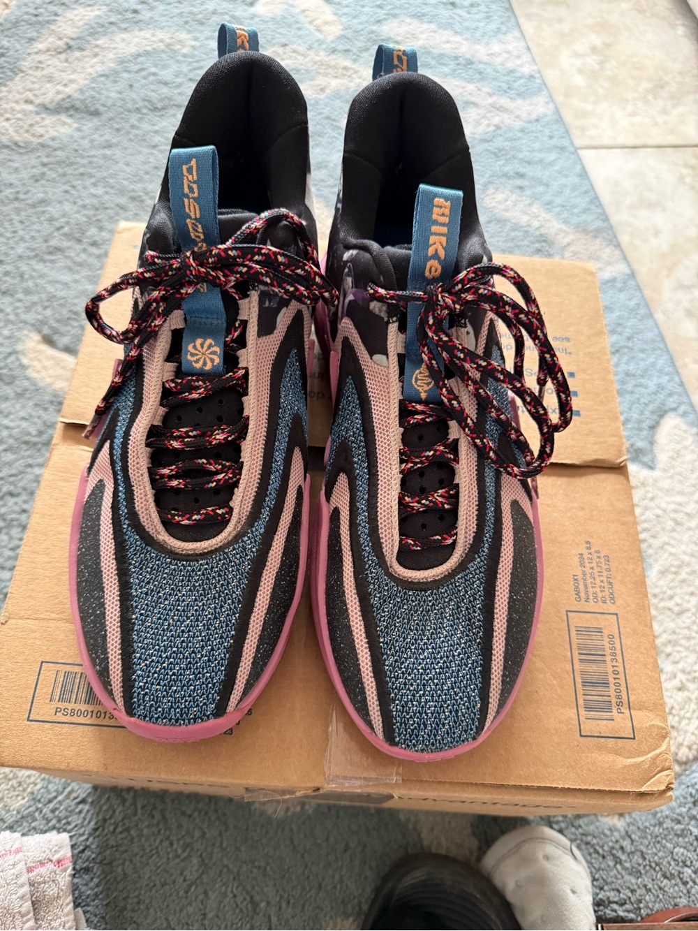 Nike cosmic unity two sneakers